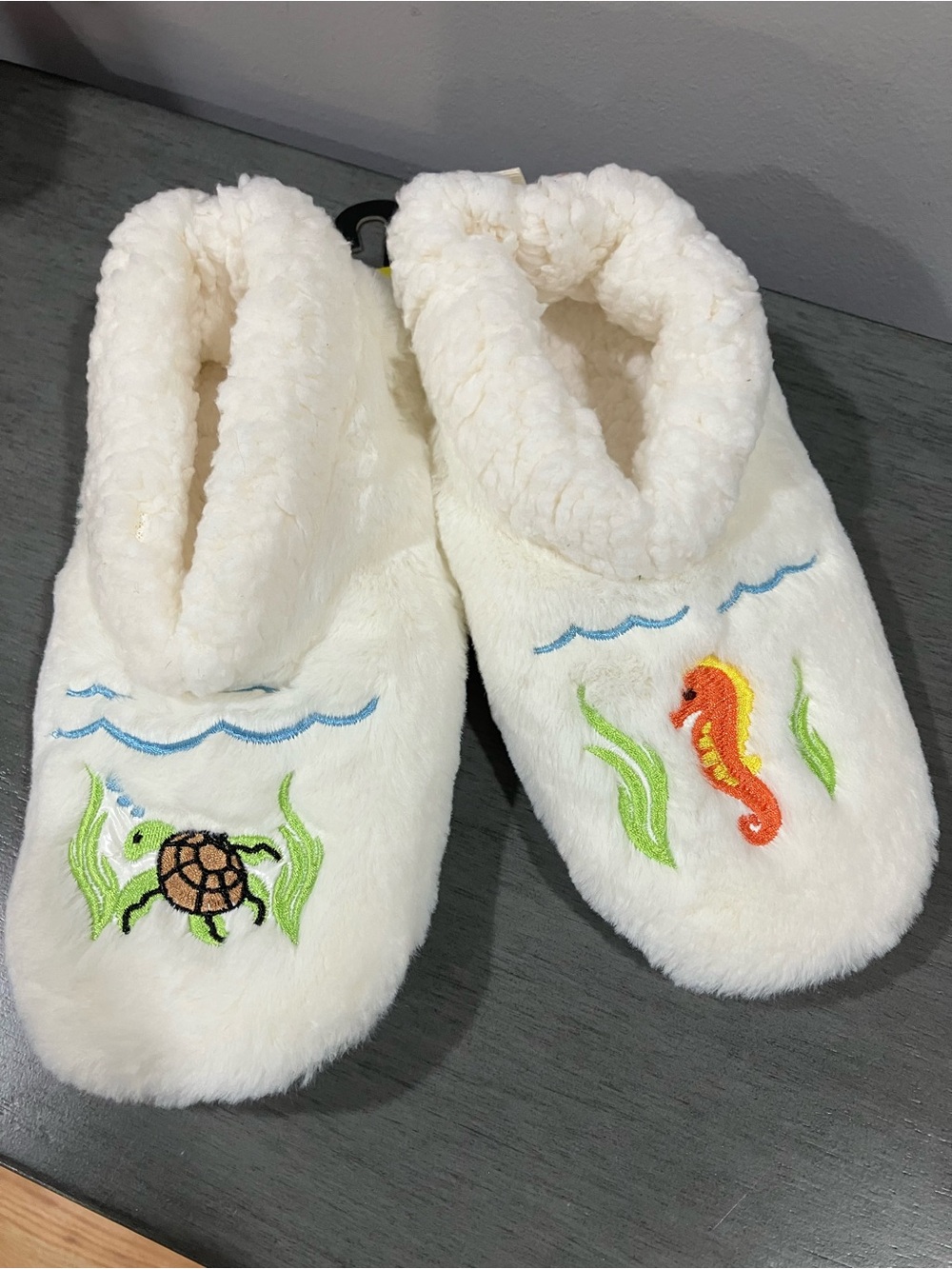 Cozy Cream Plush Fish Slippers with Sea Creature Embroidery.
